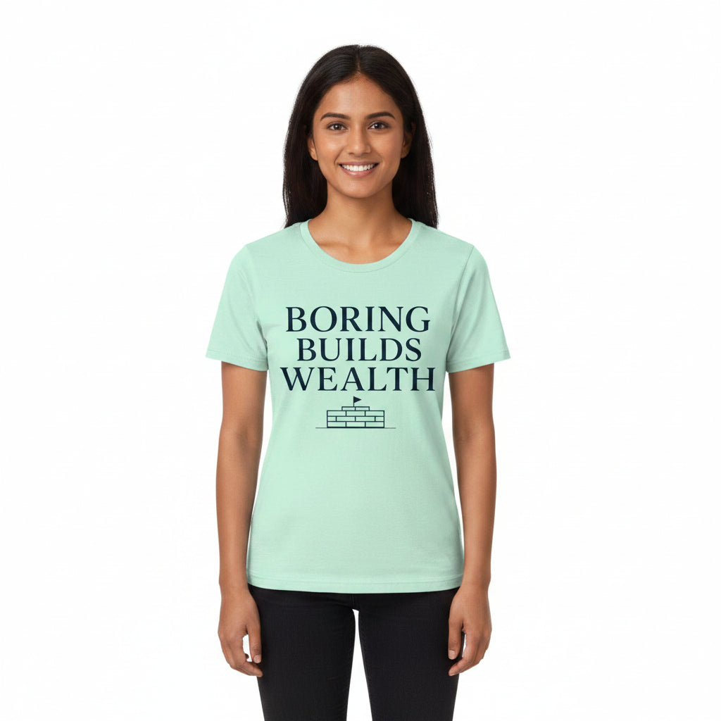 Mint green t-shirt with 'Boring Builds Wealth' text and pyramid graphic on a white background